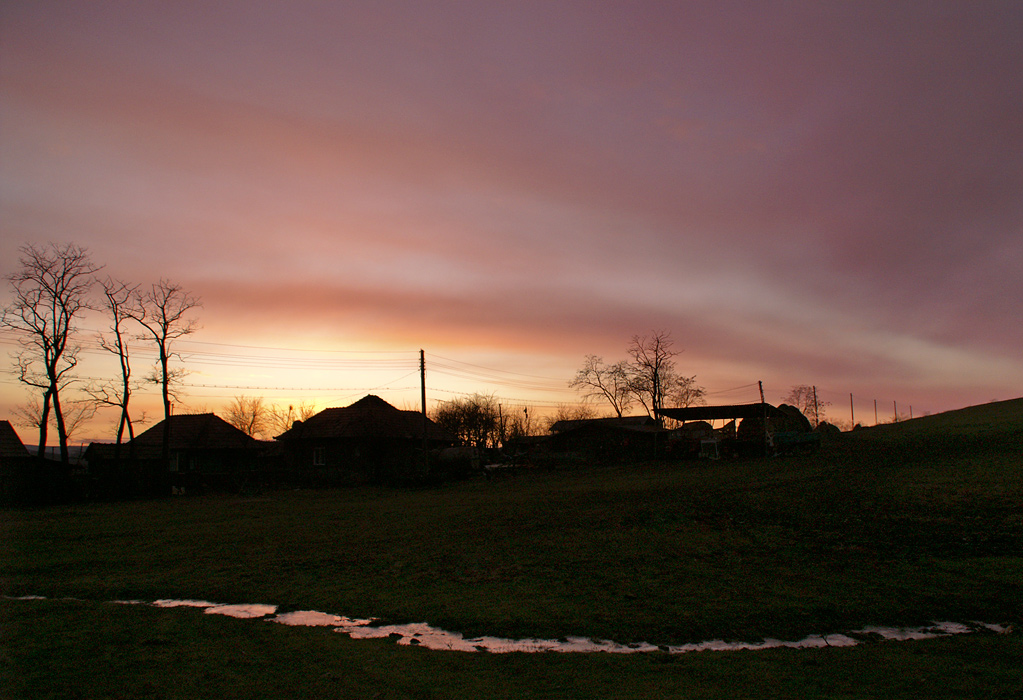 Sunset over the old houses